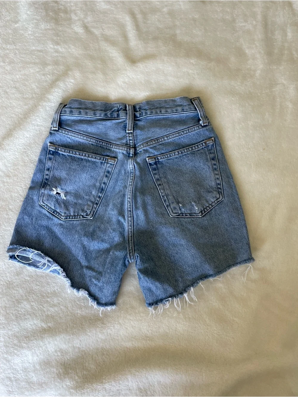 Agolde Riley Light Blue High-Rise Frayed Hem Cutoff Denim Shorts